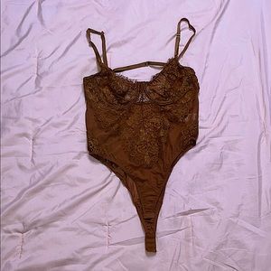 Rust lace body suit